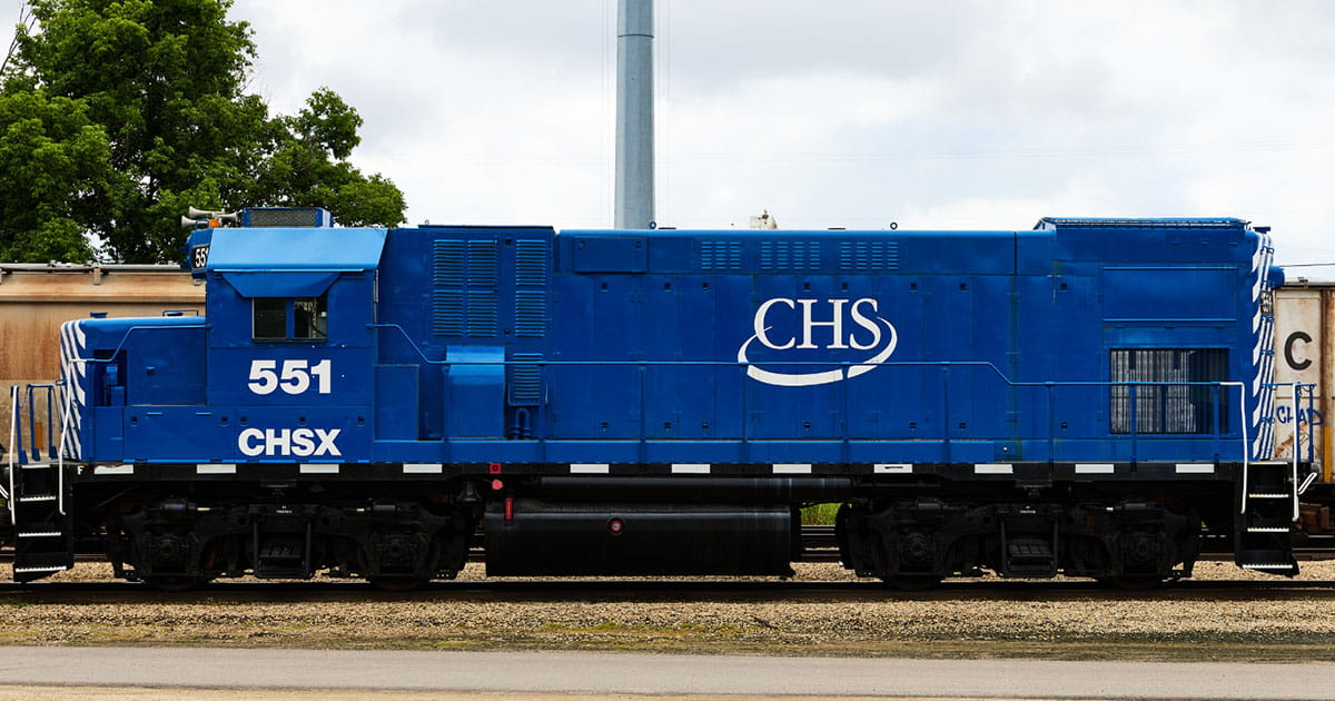 Blue railcar with the CHS logo on the side. 